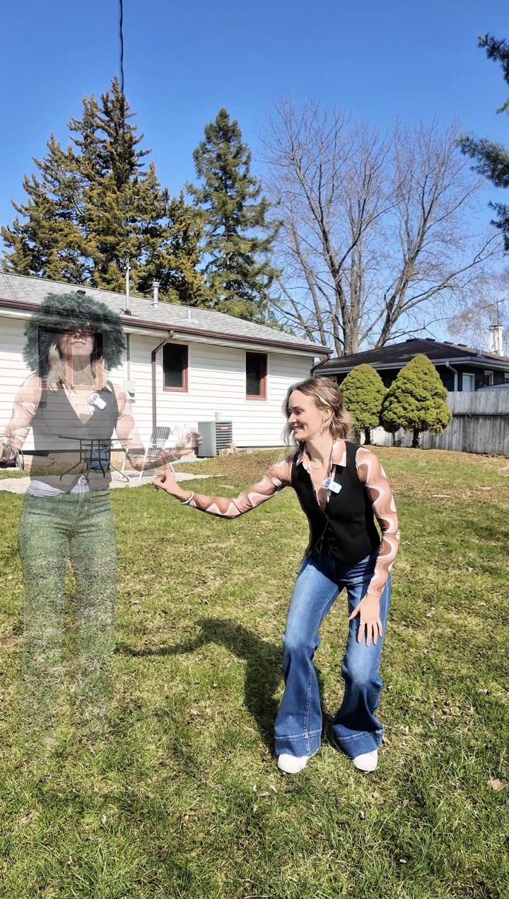 Edited photo of Bre reaching toward a ghostly double of herself