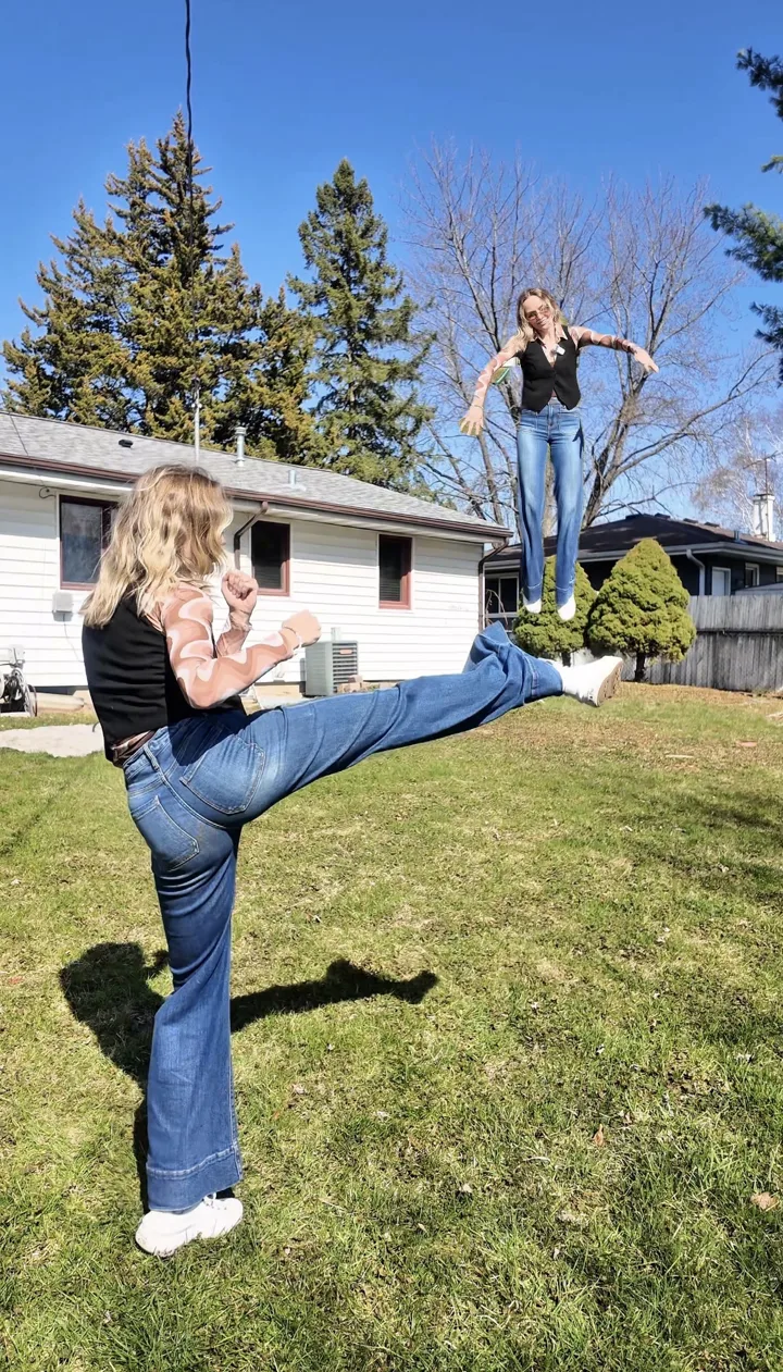 Edited photo of Bre mid-kick with a second Bre floating in the air behind her